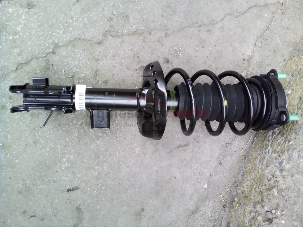 Front shock absorber assembly